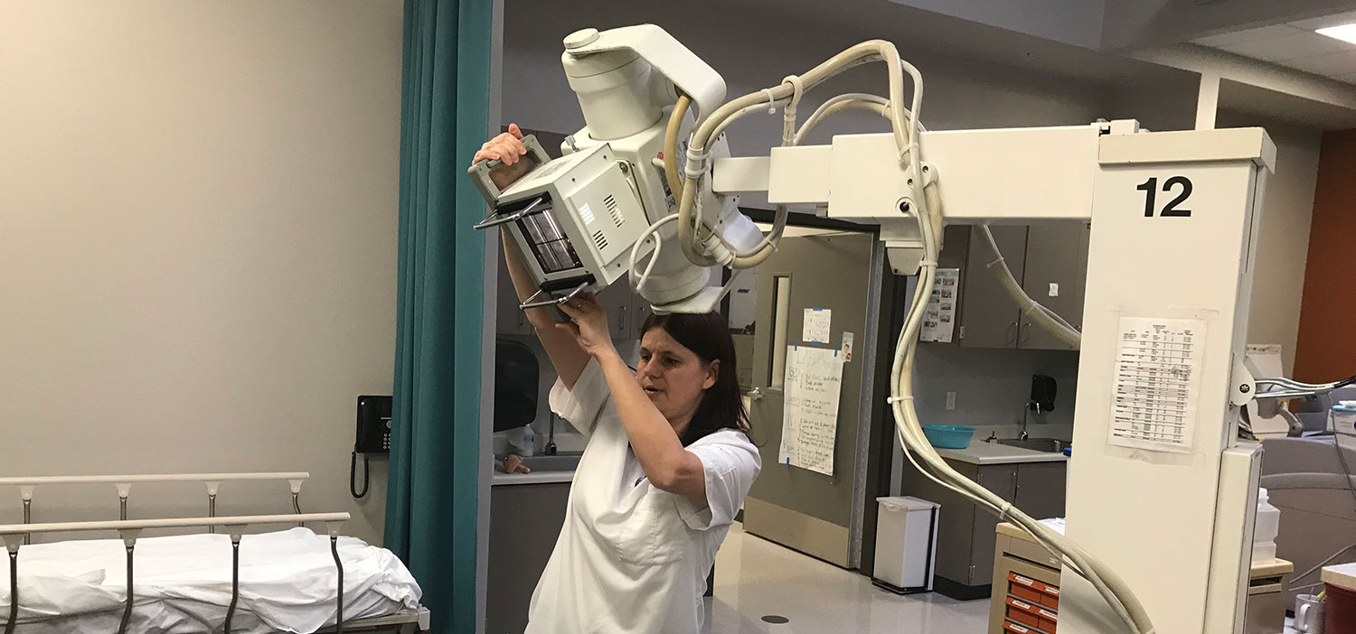 RadTech Student with x-ray machine