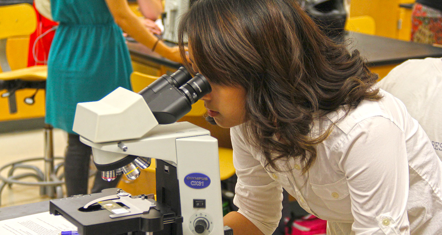 Student at Microscope