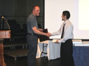 Jose receiving award